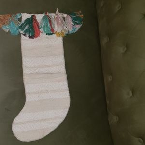 Christmas stocking with multi-colored tassles